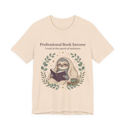 Book Lover Sloth T‑Shirt — "Professional Book Savorer: I read at the speed of molasses"