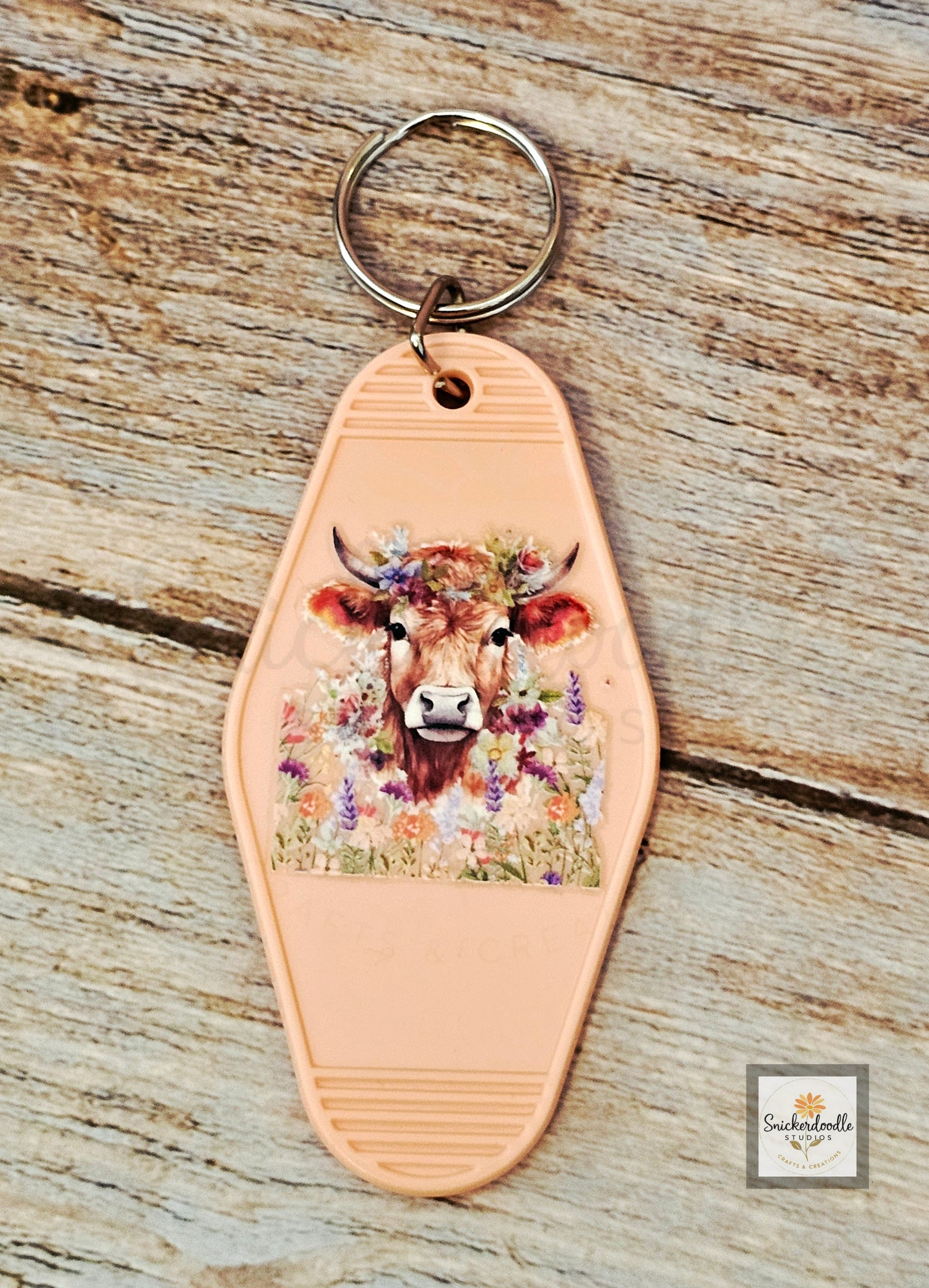 Cow-themed Motel Keychains
