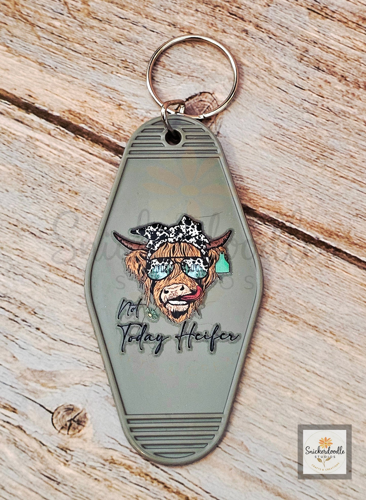 Cow-themed Motel Keychains #2