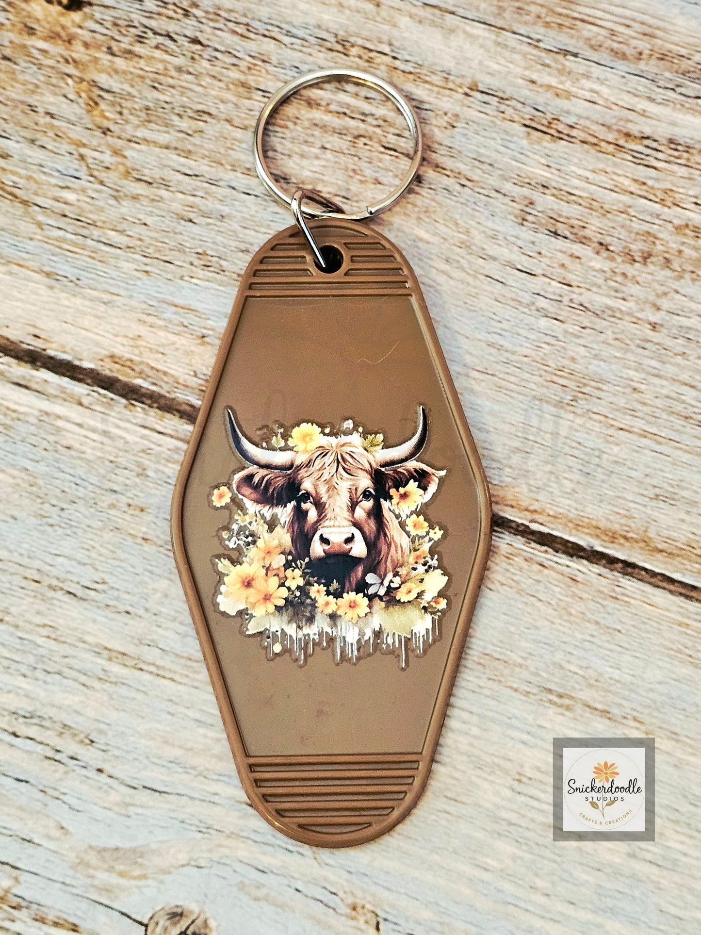 Cow-themed Motel Keychains